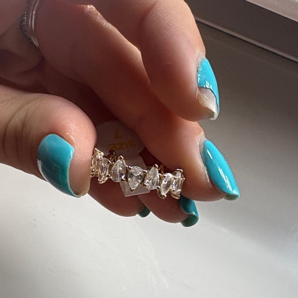 On a high note diamond cubic zirconia on gold plating band